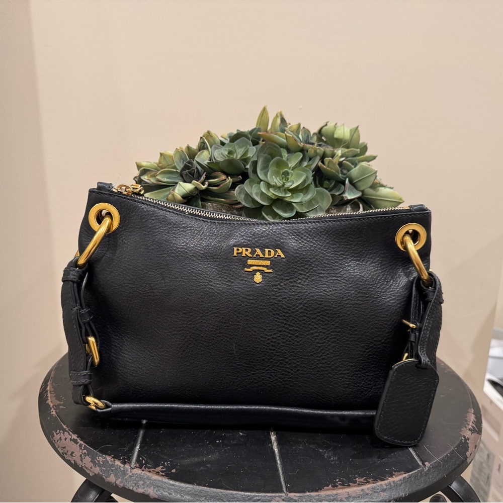 Prada Black Leather Satchel with Gold Accents